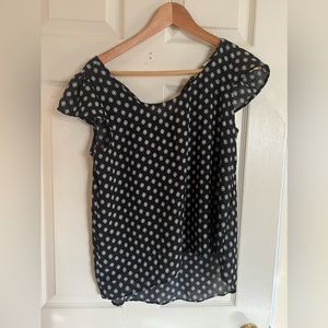 I am selling a black with white diamond medium shirt for $5.